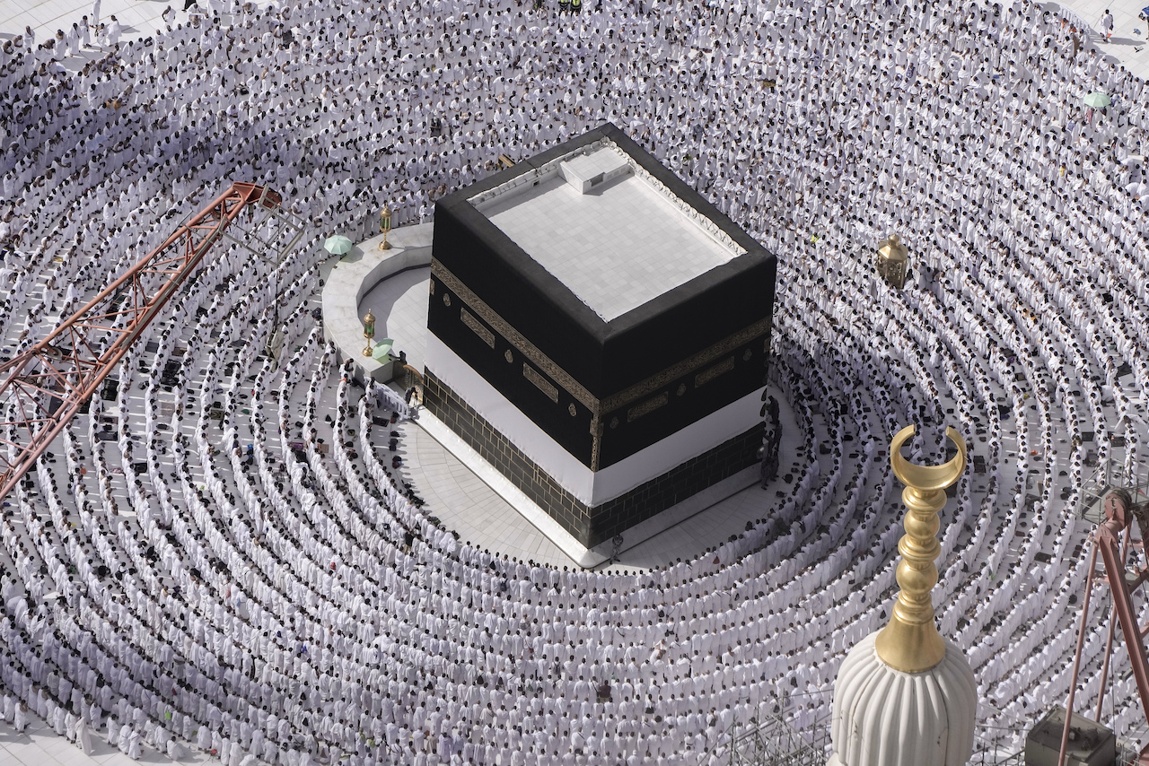 Muslim pilgrims pray around the Kaaba at the Grand Mosque during the annual Hajj pilgrimage in Makkah, Saudi Arabia, on June 25, 2023. (AFP)