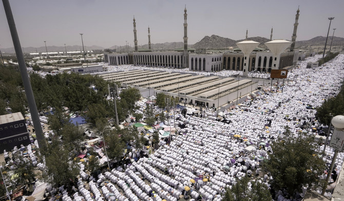 Muslim pilgrims pray outside Namira Mosque in Arafat on the second day of the annual Hajj pilgrimage near the holy city of Makkah, Saudi Arabia, June 27, 2023. (AP/File)