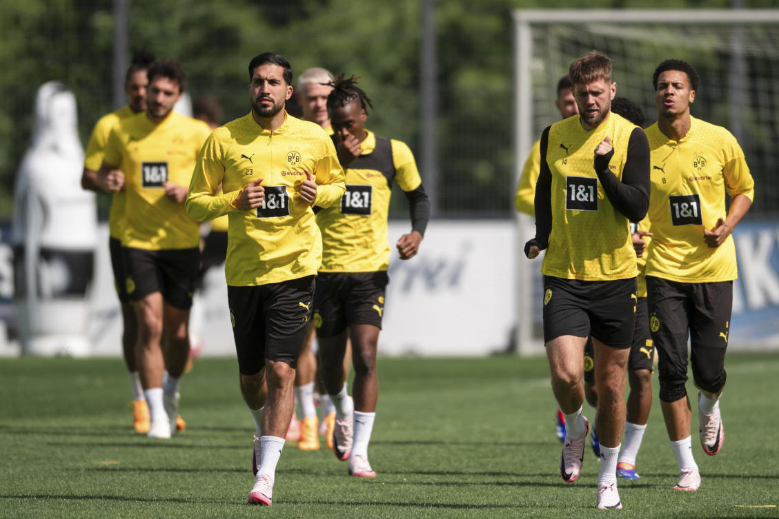 Borussia Dortmund’s Emre Can, Niclas Fullkrug and teammates attend a team training session in Cologne on May 28, 2024, ahead of their Champions League final against Real Madrid in London on Saturday. (AP)