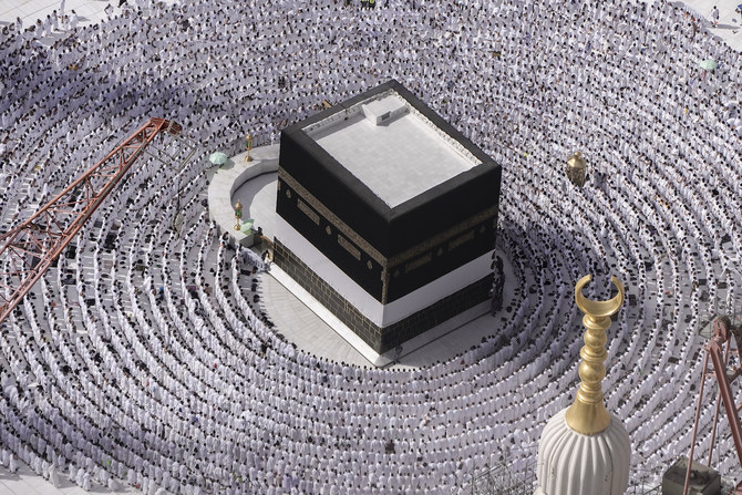 Muslim pilgrims pray around the Kaaba at the Grand Mosque during the annual Hajj pilgrimage in Makkah, Saudi Arabia, on June 25, 2023. (AFP)