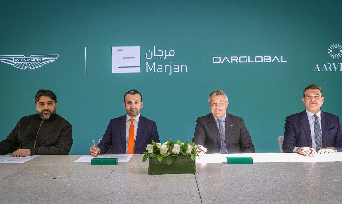 Senior officials at the signing ceremony for the partnership.