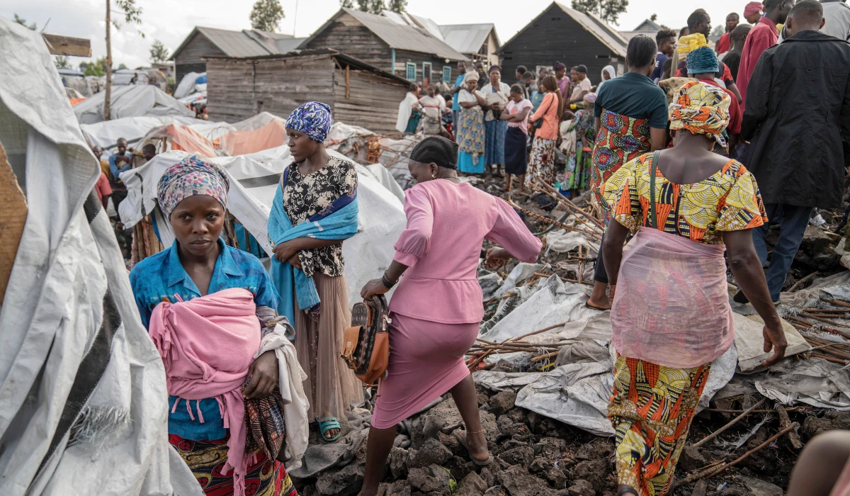 People gather at the side of an explosion in a refugee camp on the outskirts of Goma, Democratic Republic of the Congo, Friday, May, 3, 2024. (AP)