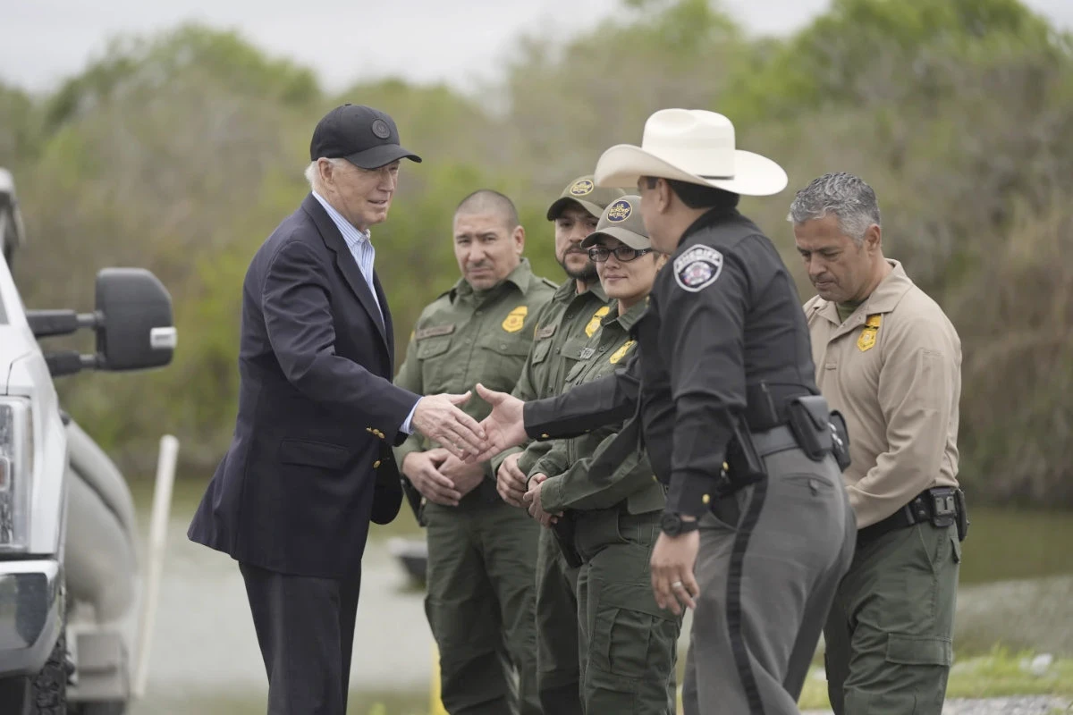 President Joe Biden talks with the US Border Patrol and local officials, as he looks over the southern border, on Feb. 29, 2024, in Brownsville, Texas, along the Rio Grande. (AP)