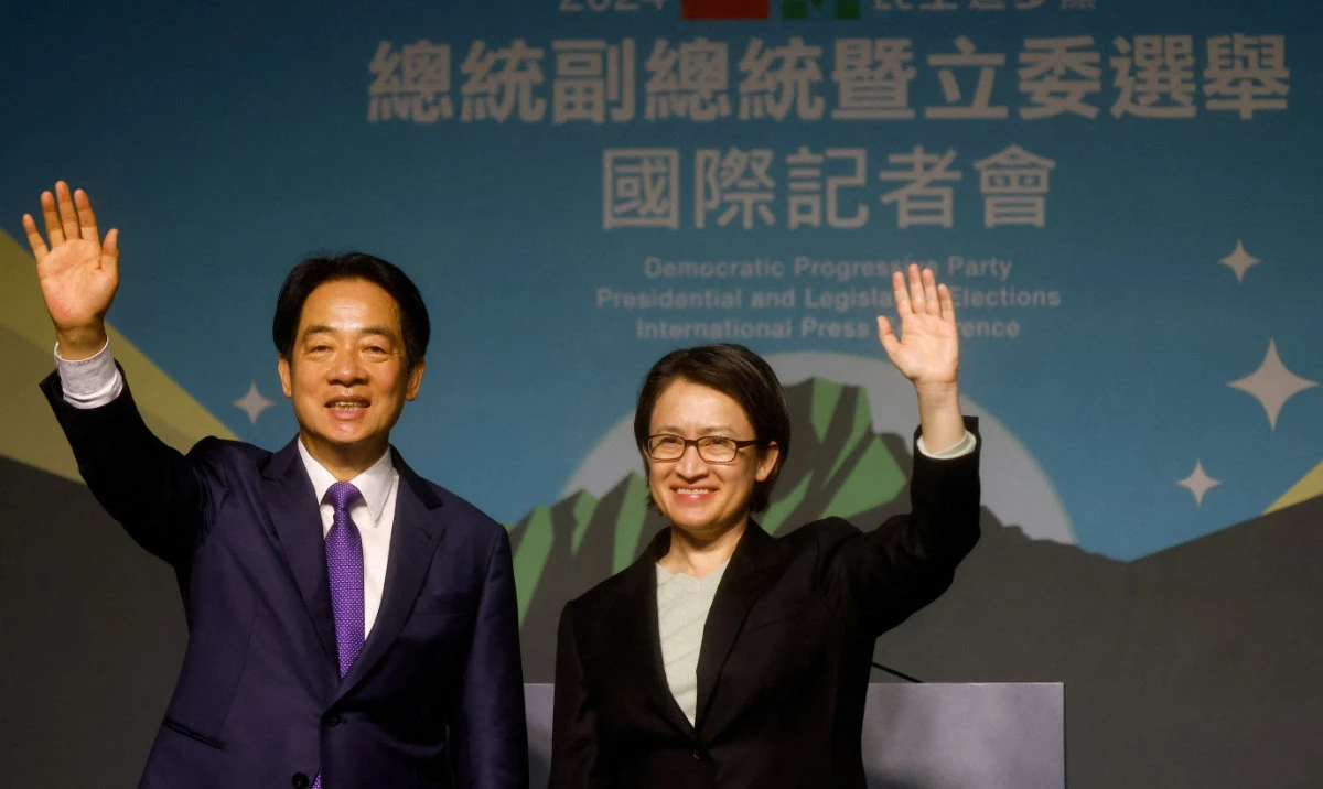 Taiwan President-elect Lai Ching-te, of Democratic Progressive Party’s and his running mate Hsiao Bi-khim wave as they hold a press conference, following the victory in the presidential elections, in Taipei, Taiwan, January 13. (Reuters)