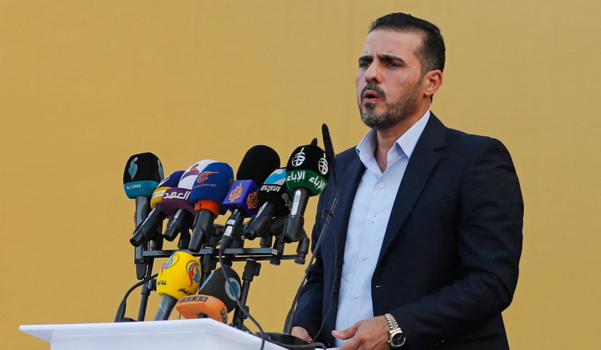 Abu Ali al-Askari, spokesperson of Iraqi Kataeb Hezbollah, speaks during a campaign rally in Baghdad. (AFP file photo)