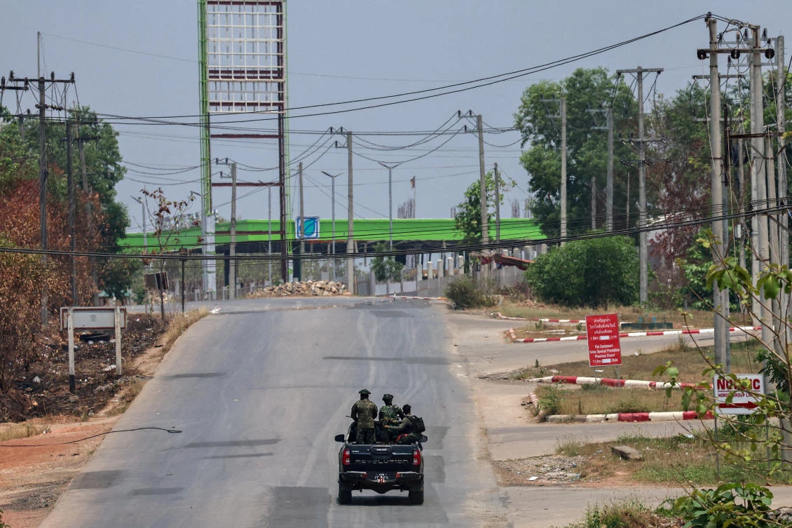 Myanmar’s borderlands are home to a plethora of ethnic armed groups, many of whom have battled the military since independence from Britain in 1948. Above, soldiers from the Karen National Liberation Army patrol next to an area destroyed by Myanmar’s airstrike in Myawaddy, the Thailand-Myanmar border town, on April 15, 2024. (Reuters)