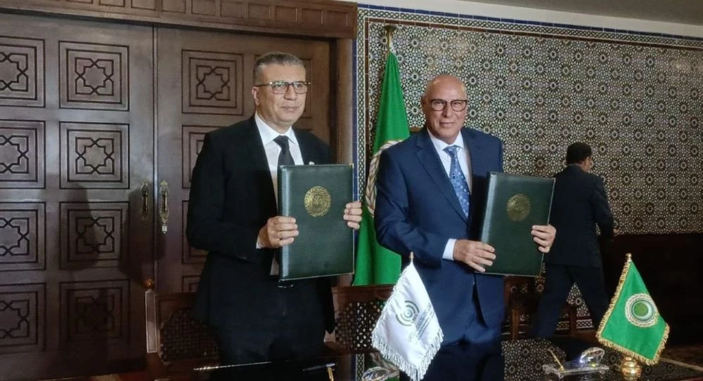 Ahmed Rashid Khattabi, right, and the Director General of the Islamic Broadcasting Union Amr Ellissy. (X/@osbu_org)