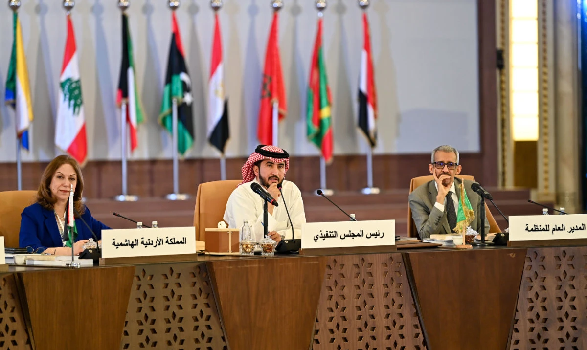 Hani Al-Moqbel, chairperson of ALESCO’s Executive Council, center, Mohammed Walad Amar, the director general of ALECSO, right, during the conference in Jeddah. (Supplied)