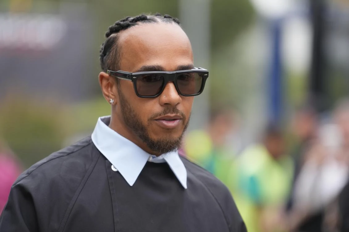 Mercedes driver Lewis Hamilton of Britain arrives at the Dino and Enzo Ferrari racetrack, in Imola, Italy, on April 16, 2024. (AP)