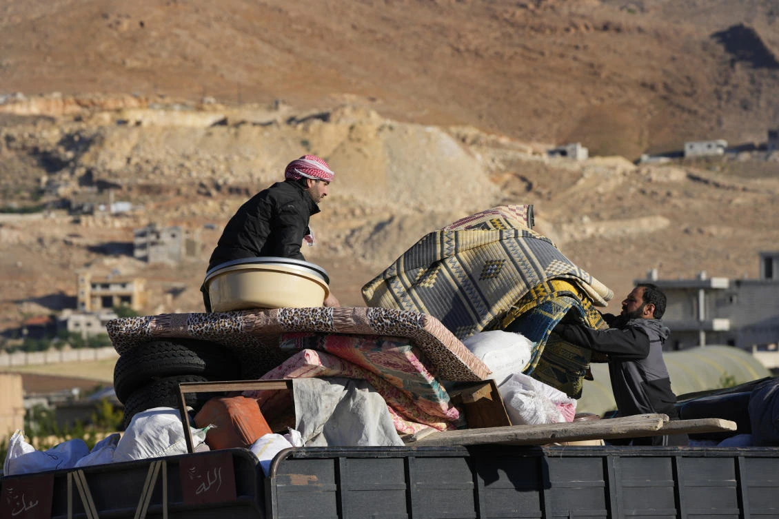 Hundreds of Syrians refugees left a remote northeastern Lebanese town back to Syria in a convoy, amid a surge in anti-refugee sentiment in the small, crisis-hit country. (File/AP)