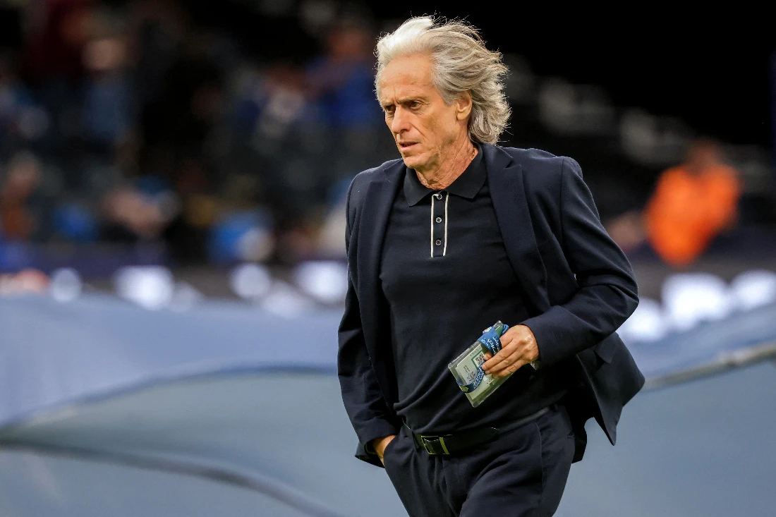 Hilal's Portuguese coach Jorge Jesus walks on the pitch before the start of the Saudi Pro League football match between Al-Hilal and Al-Akhdoud in April. (File/AFP)