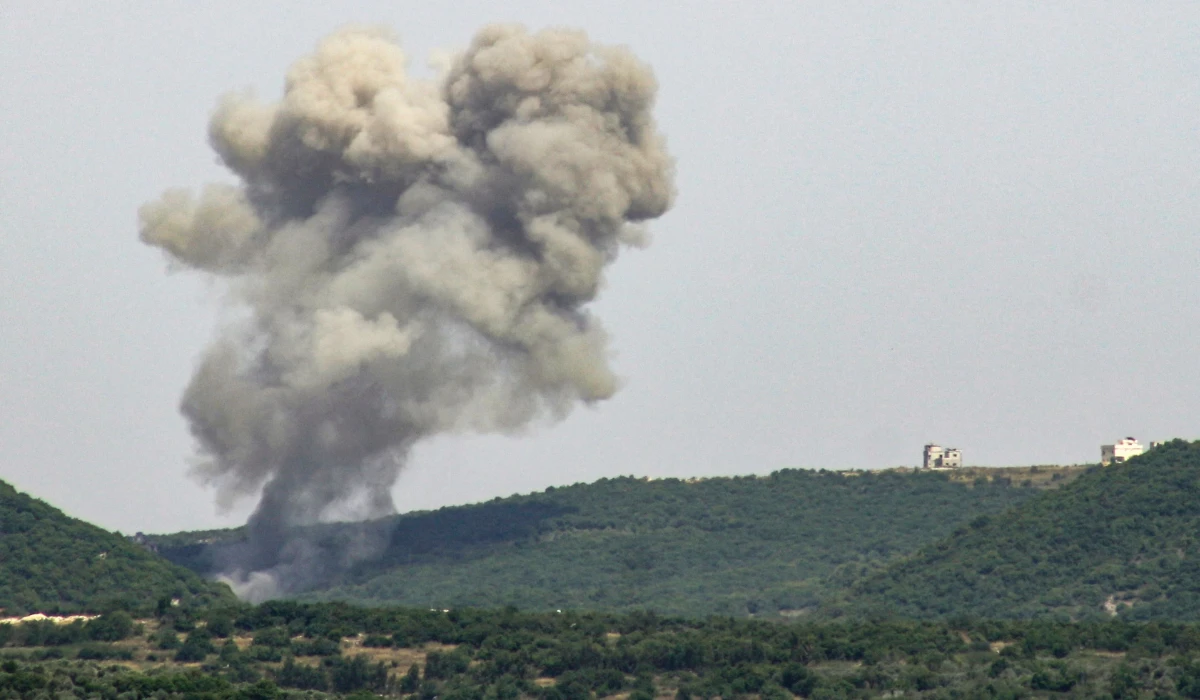Smoke billows from the site of an Israeli airstrike on the outskirts of the southern Lebanese village of Ramiah on May 18, 2024, amid ongoing cross-border clashes between Israeli troops and Hezbollah fighters. (AFP)
