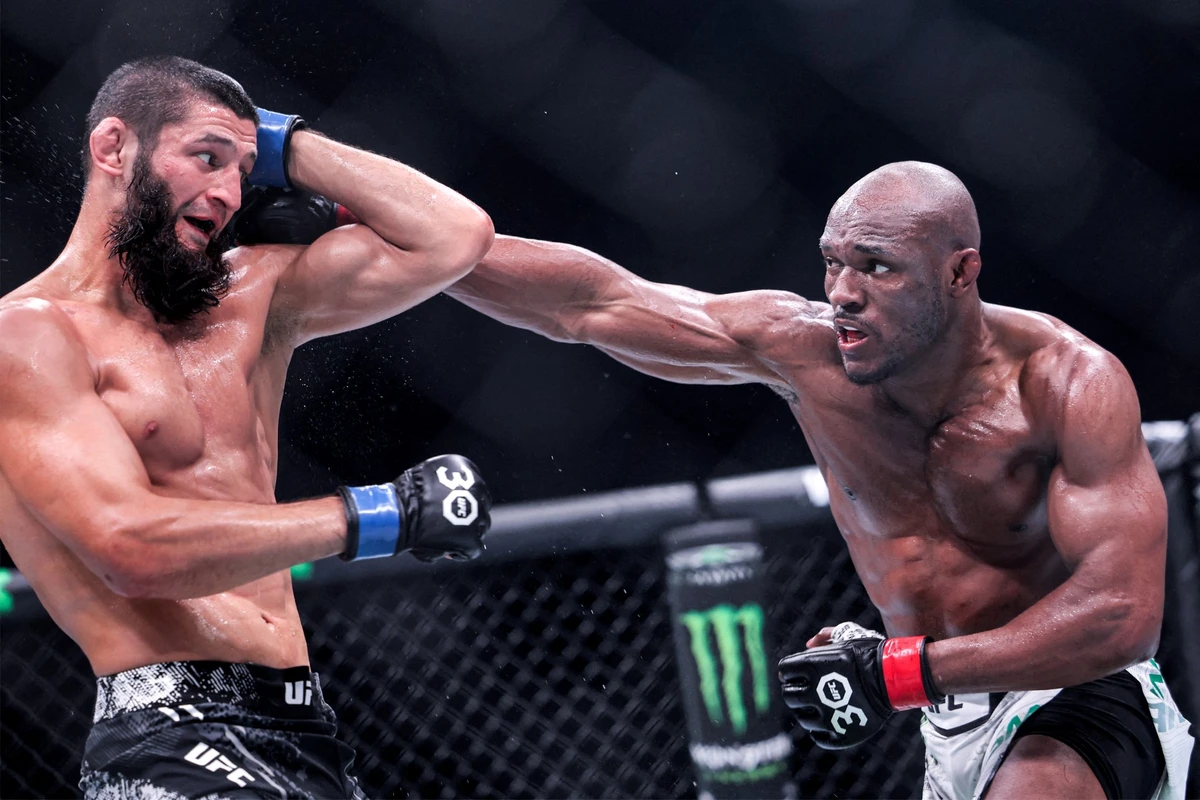 Russia's Khamzat Chimaev (black) and Nigeria's Kamaru Usman (white) compete in their Middleweight bout during the Ultimate Fighting Championship 294 (UFC) event at the Etihad Arena in Abu Dhabi on October 21, 2023.