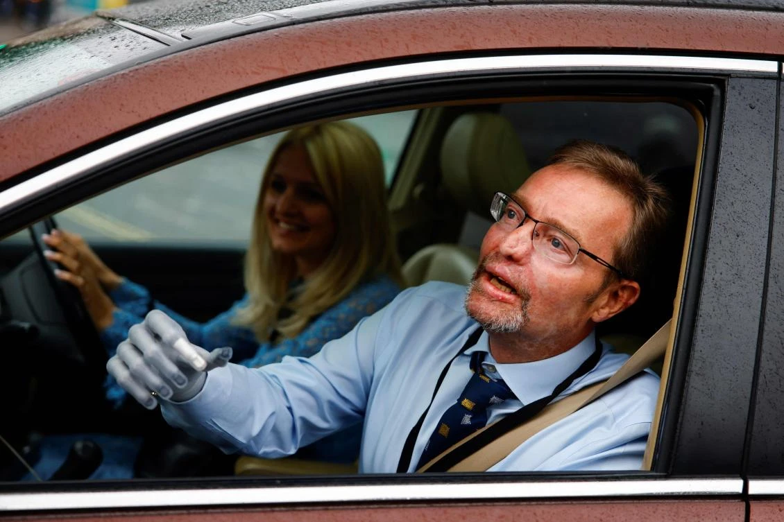 Britain’s Conservative MP Craig Mackinlay arrives at Westminster Palace on Wednesday ahead of the weekly session of Prime Minister’s Questions (PMQs) in the House of Commons. (AFP)