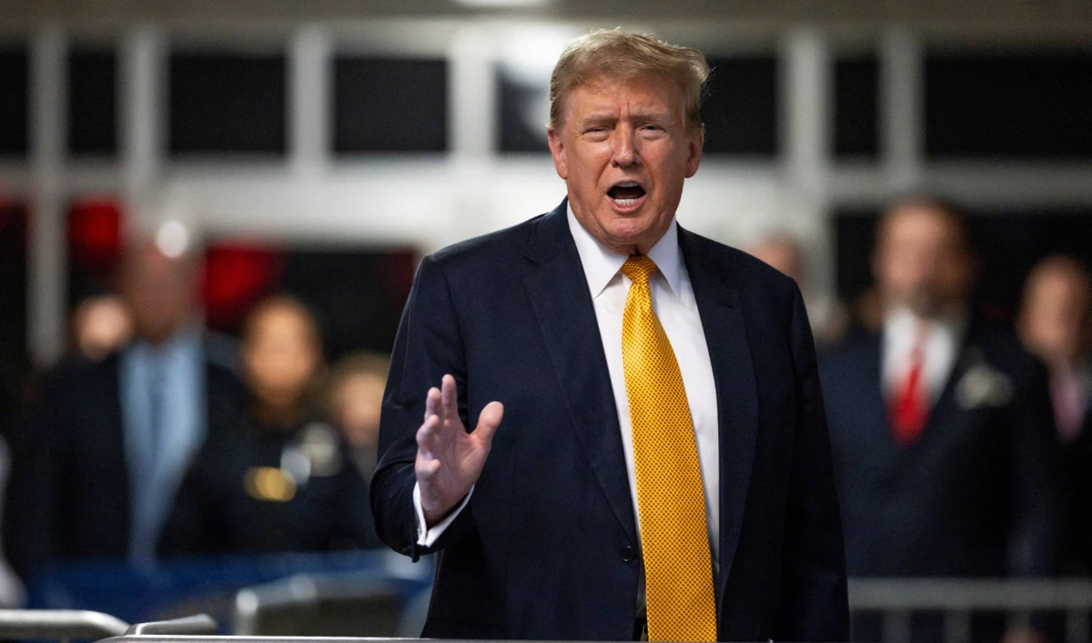 Former US President and Republican presidential candidate Donald Trump speaks to the press as he returns from a break in his criminal trial at Manhattan Criminal Court in New York City, on May 21, 2024. (AFP)