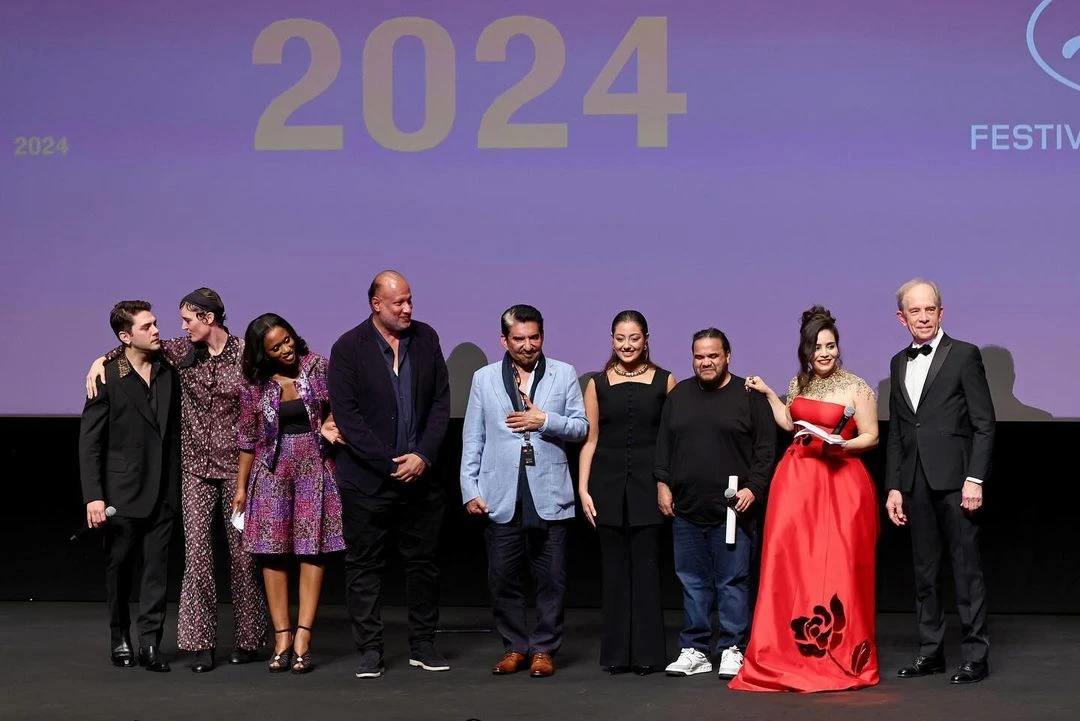 The cast and crew, accompanied by director Tawfik Al-Zaidi, stepped onto the stage to accept the accolade. (AN/ Ammar Abd Rabbo)