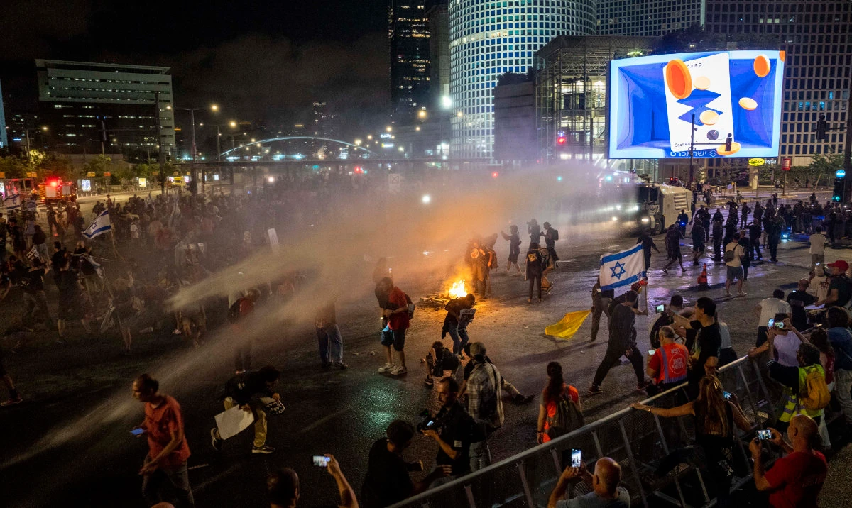 Police use water cannon to disperse demonstrators during a protest against Israeli Prime Minister Benjamin Netanyahu's government, and calling for the release of hostages held in the Gaza Strip by the Hamas militant group, in Tel Aviv, Israel, Saturday, May 25, 2024. (AP)