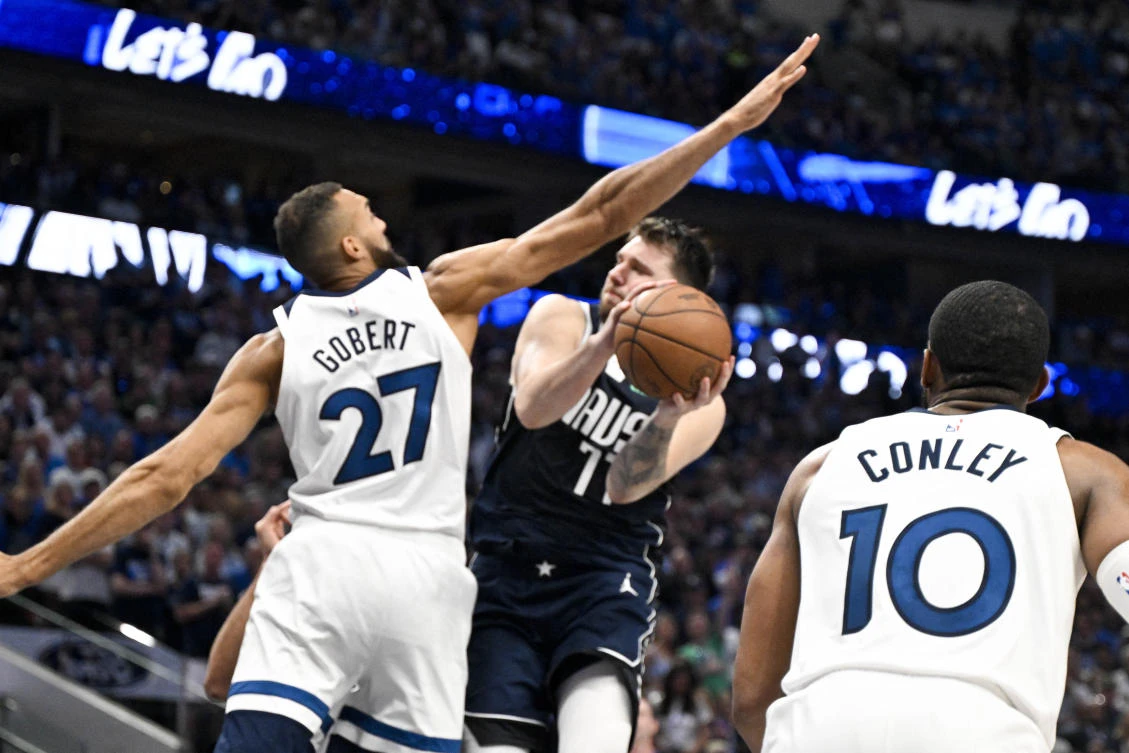 Dallas Mavericks’ Luka Doncic drives to the basket past Minnesota Timberwolves’ center Rudy Gobert during game three of their western conference finals for the 2024 NBA playoffs. (USA TODAY Sports)