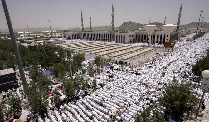 Muslim pilgrims pray outside Namira Mosque in Arafat on the second day of the annual Hajj pilgrimage near the holy city of Makkah, Saudi Arabia, June 27, 2023. (AP/File)