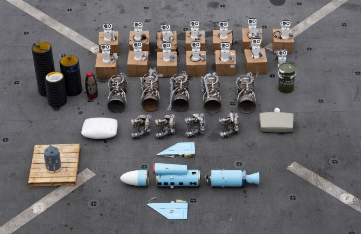 This undated photograph released by the US military's Central Command and obtained on January 18, 2024, shows what it is described as Iranian-made missile components bound for Yemen's Houthi seized off a vessel in the Arabian Sea (AFP)