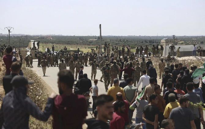 The main insurgent group in rebel-held northwest Syria blasted the US on Thursday over its criticism of a crackdown on protesters in areas outside government control. (AP/File)