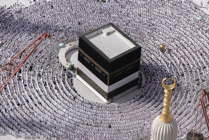 Muslim pilgrims pray around the Kaaba at the Grand Mosque during the annual Hajj pilgrimage in Makkah, Saudi Arabia, on June 25, 2023. (AFP)
