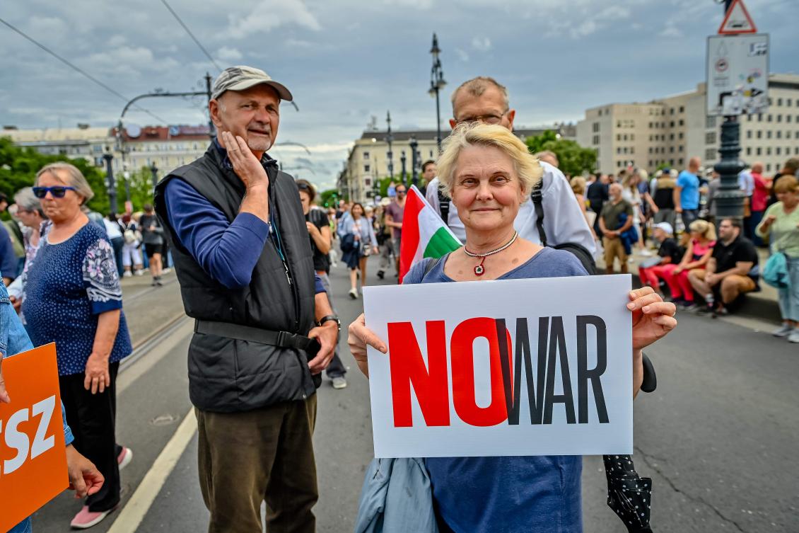 Sympathizers and members of Hungarian parties FIDESZ and KDNP (Christian Democratic Party) march in Budapest on Jun. 01, 2024, during their Peace March, to demonstrate for the peace in Ukraine, one week before the EU election. (AFP)