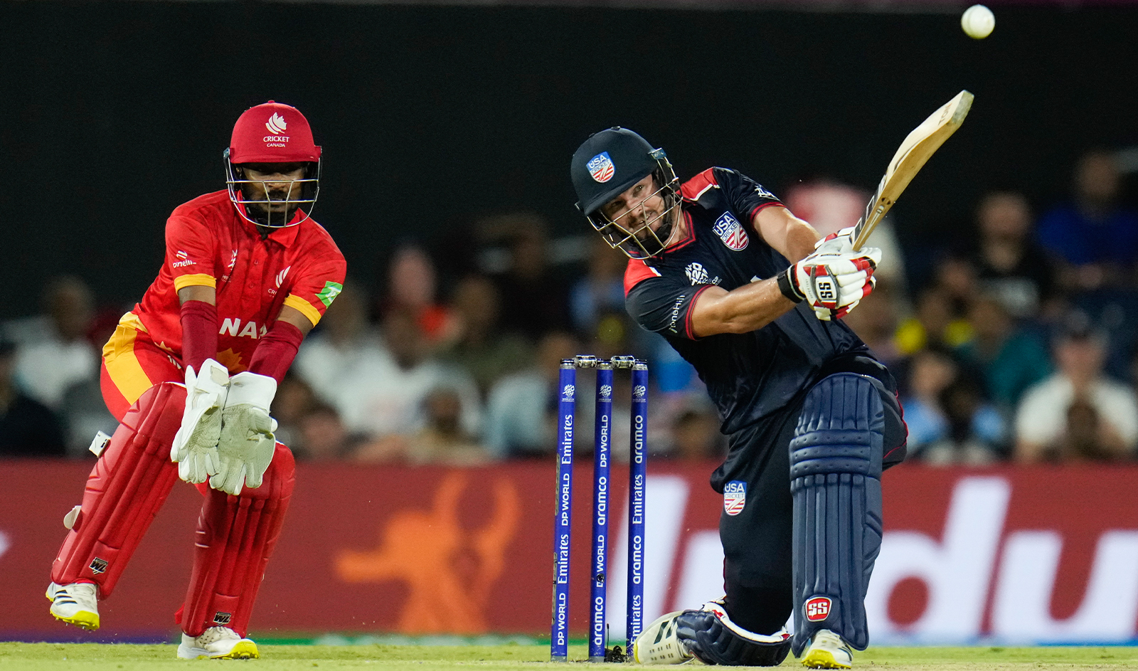 United States' Andries Gous hits the ball for six runs during the men's T20 World Cup cricket match between the United States and Canada at Grand Prairie Stadium, in Grand Prairie, Texas, on June 1, 2024. (AP)