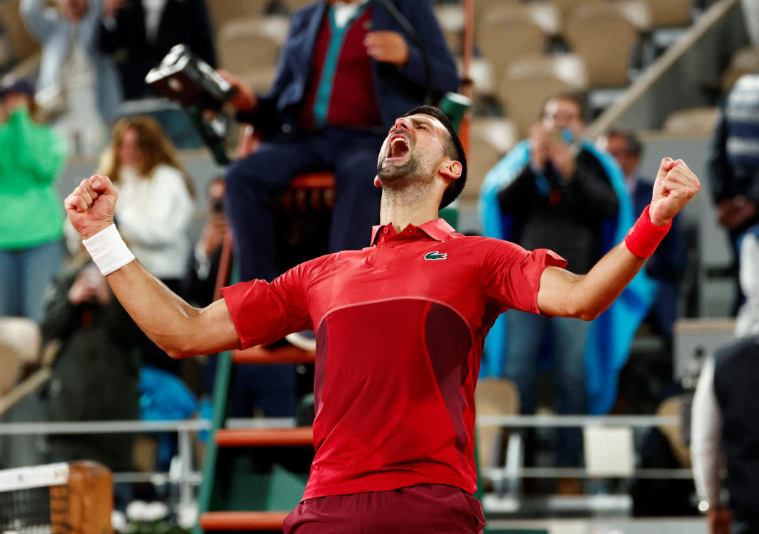 Serbia’s Novak Djokovic celebrates after winning his match against Italy’s Lorenzo Musetti at the French Open on June 1, 2024. (Reuters)