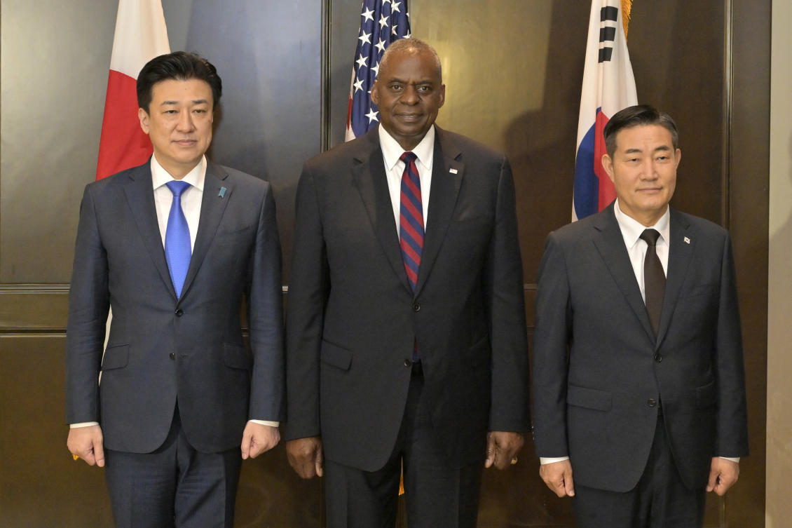 Japan Defense Minister Minoru Kihara, left, US Defense Secretary Lloyd Austin, center, and South Korea Defence Minister Shin Won-sik pose for media at a trilateral meeting on sidelines of the Shangri-la Dialogue in Singapore Sunday, June 2, 2024. (AP)