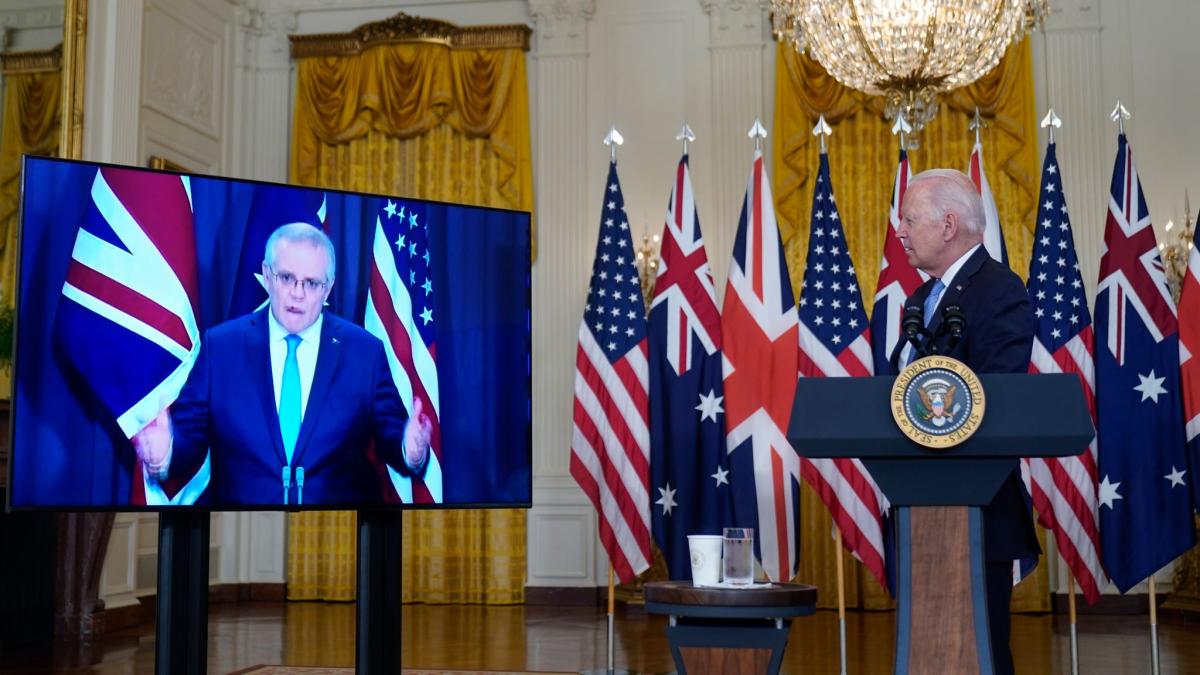 US President Joe Biden listens to Australian Prime Minister Scott Morrison as the AUKUS deal is announced. (AP)