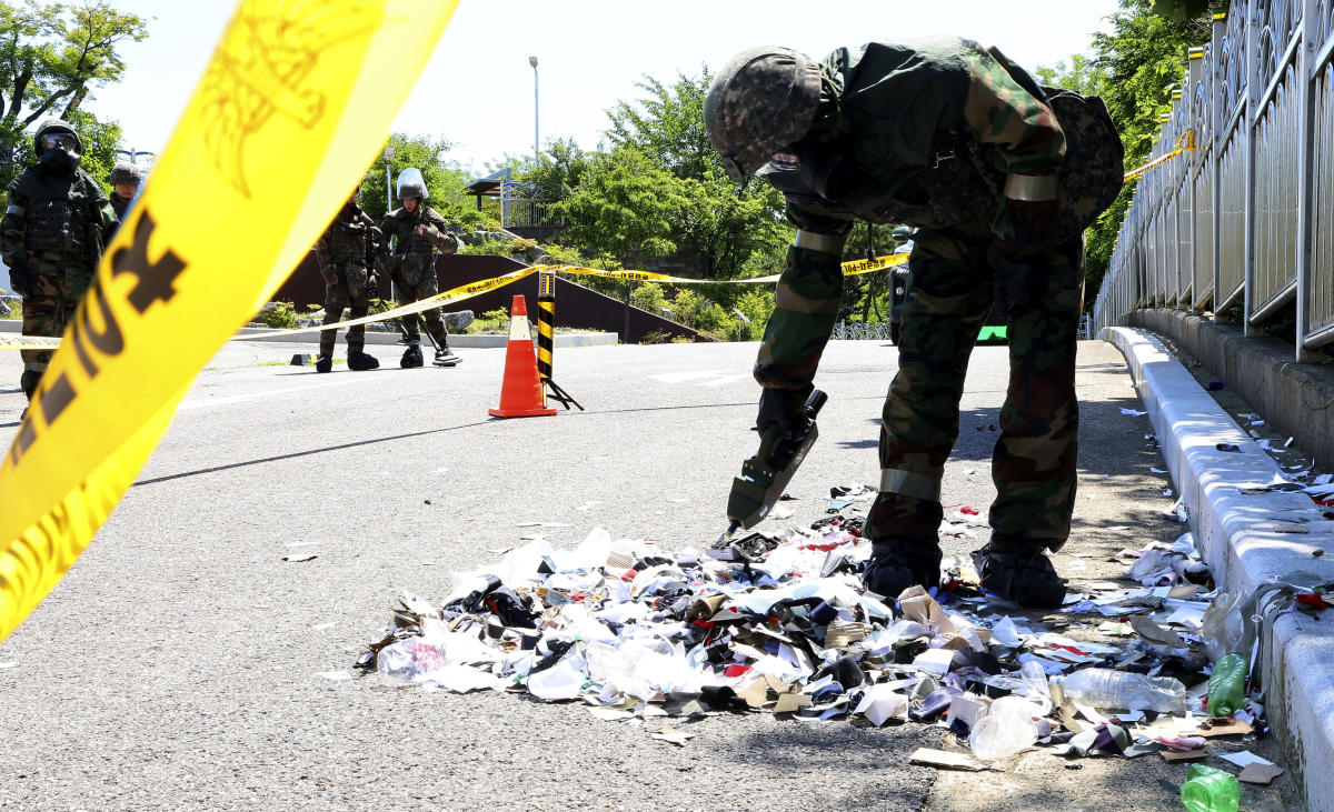 Pyongyang has said the balloons were in retaliation for a propaganda campaign by North Korean defectors and activists in the South. Above, a South Korea soldier wearing protective gears checks the trash from a balloon in Incheon on June 2, 2024. (Yonhap via AP)