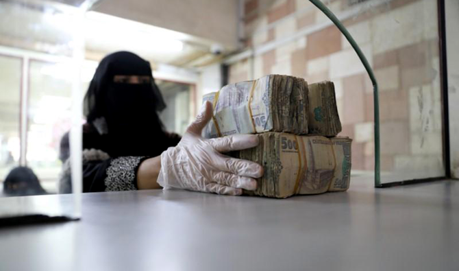 The riyal was 215 to the dollar when the Houthis placed the Yemeni President Abed Rabbo Mansour Hadi under house arrest in early 2019. (Reuters/File Photo)