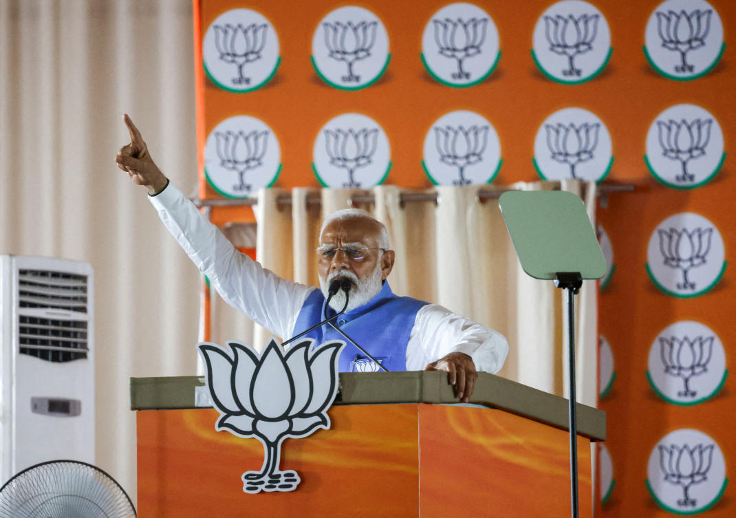 India's Prime Minister Narendra Modi gestures as he addresses supporters during an election campaign rally, in New Delhi, India, May 22, 2024. (Reuters)
