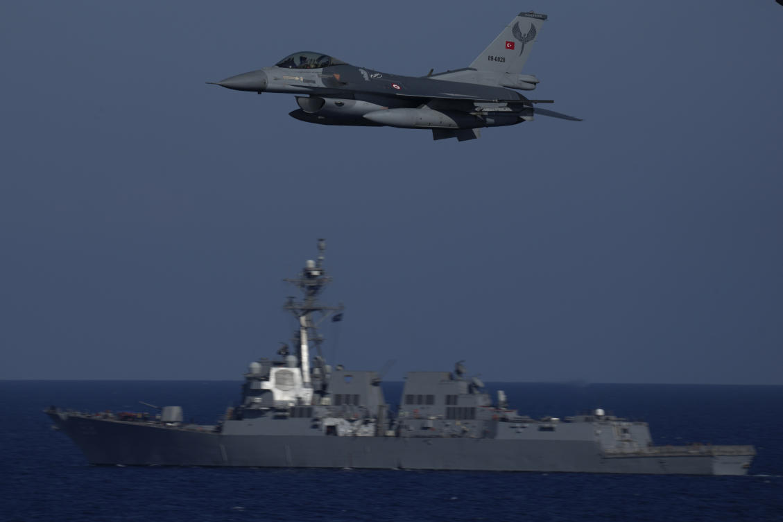 A Turkish F16 fighting jet flies over naval ships during an annual NATO naval exercise on Turkey's western coast on the Mediterranean, Thursday, Sept. 15, 2022. (File/AP)