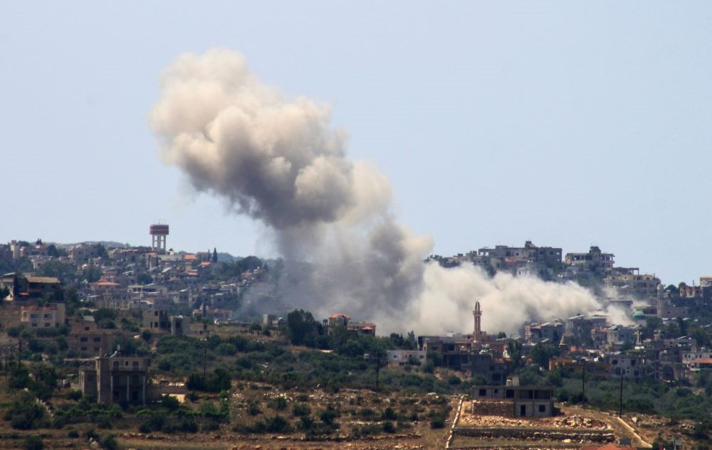 Smoke billows from the site of an Israeli airstrike on the southern Lebanese village of Aita Al-Shaab, near the border with Israel, June 4, 2024. (AFP)