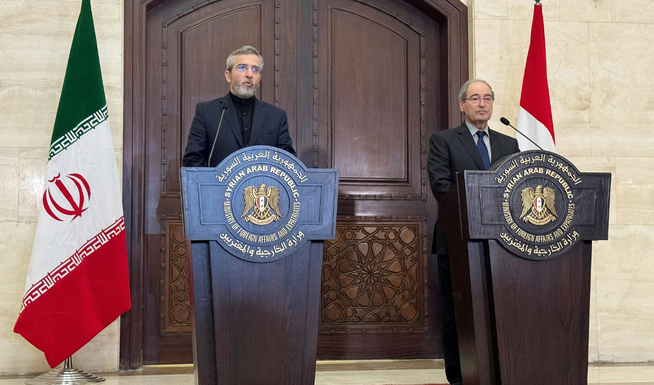 Iran’s acting Foreign Minister Ali Bagheri Kani attends a press conference with Syrian Foreign Minister Faisal Mekdad in Damascus on Tuesday. (Reuters)