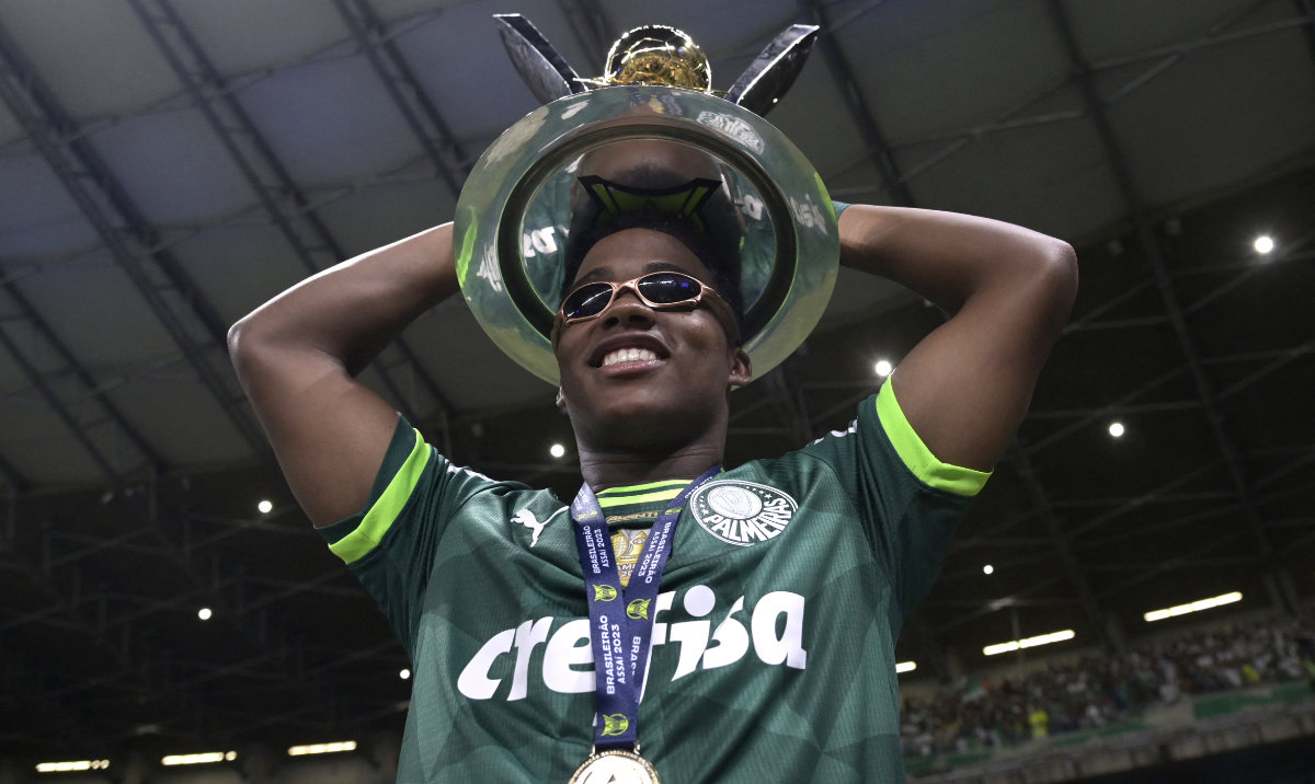 Palmeiras’ Brazilian forward Endrick celebrates with the trophy after winning the Brazilian Championship following the match between Cruzeiro and Palmeiras at Minerao stadium in Belo Horizonte, Brazil, on Dec. 6, 2023. (File/AFP)