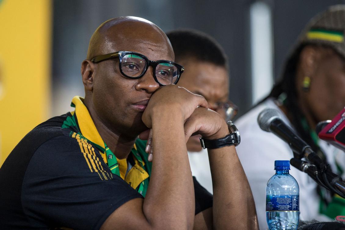South Africa’s Sports Minister Zizi Kodwa appeared in a courtroom in Johannesburg alongside another suspect in the case on Wednesday. (AFP)