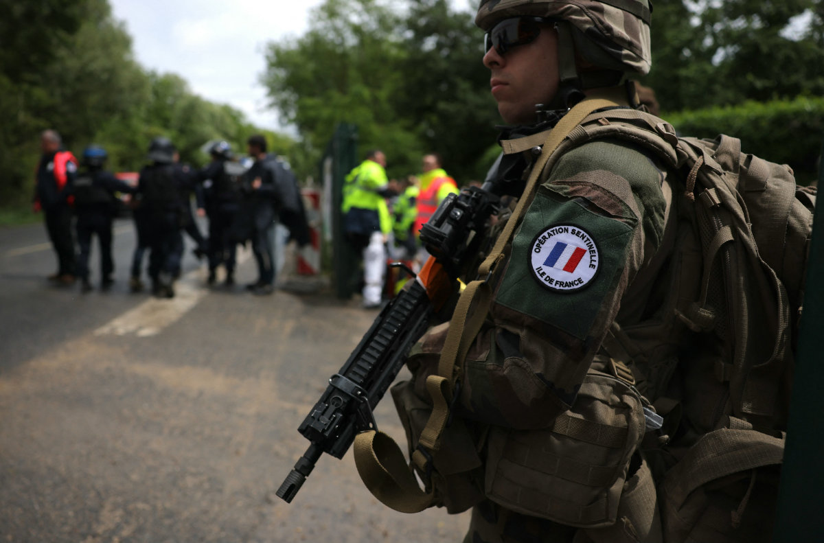 French security forces take part in a simulation against terrorist attacks on the Olympic site of Vaires-sur-Marnes on May 30 2024. (AFP)
