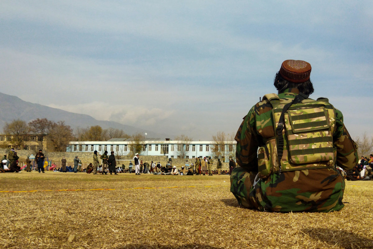 A Taliban security personnel keeps watch ahead of the court flogging of women and men at a football stadium in Charikar city of Parwan province on December 8, 2022. (AFP/File)