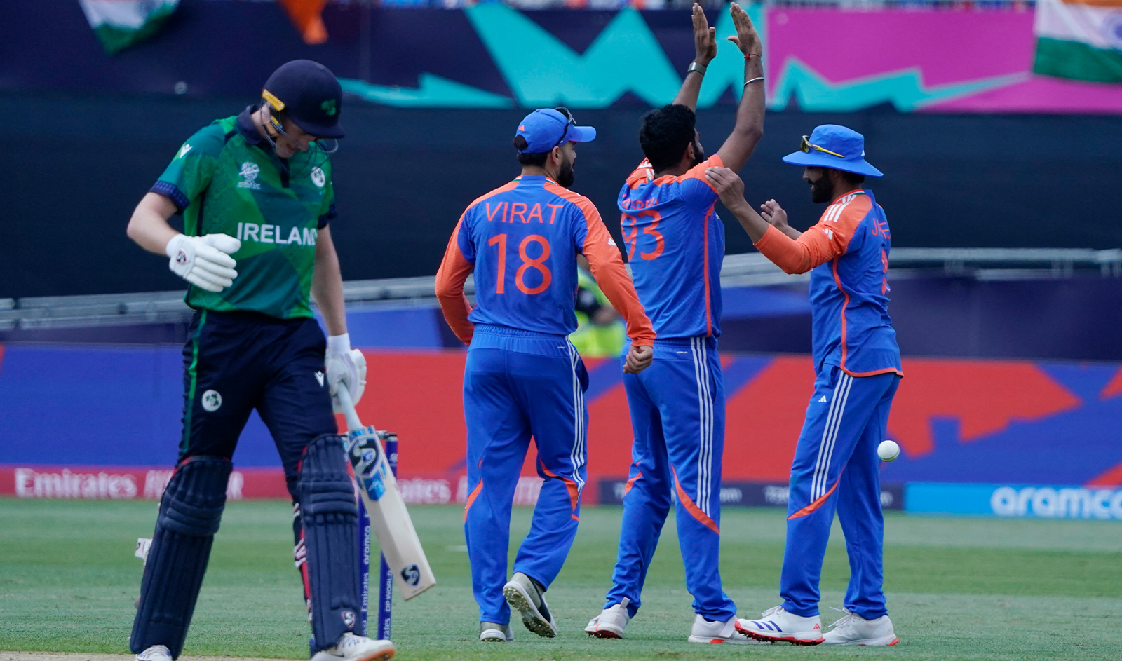 India's Jasprit Bumrah (2nd R) celebrates after Ireland's Harry Tector (L) is caught out during the ICC men's Twenty20 World Cup 2024 group A cricket match between India and Ireland at Nassau County International Cricket Stadium in East Meadow, New York, on June 5, 2024. (AFP)