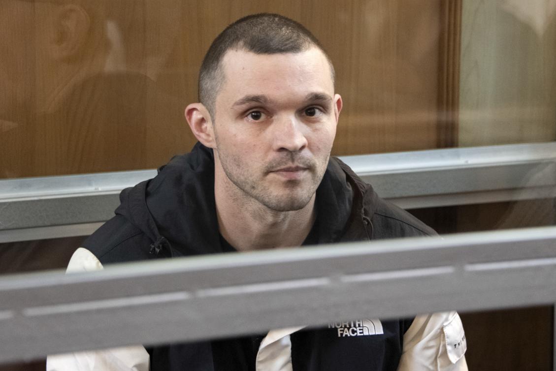 US Army Staff Sgt. Gordon Black sits in a glass cage in courtroom in Vladivostok, Russia, on Jun. 6, 2024. (AP)