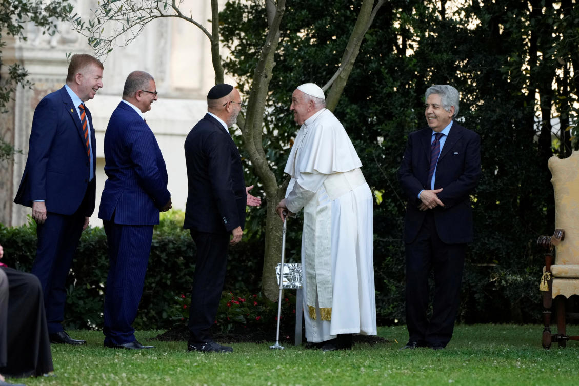 Pope Francis, center, talks with from left, Raphael Schutz, the Israeli ambassador to the Holy See, Issa Kassissieh, the Palestinian ambassador to the Holy See Rabbi Abramo Alberto Funaro, and Redouane Abdellah of Rome's Islamic center. (Reuters)