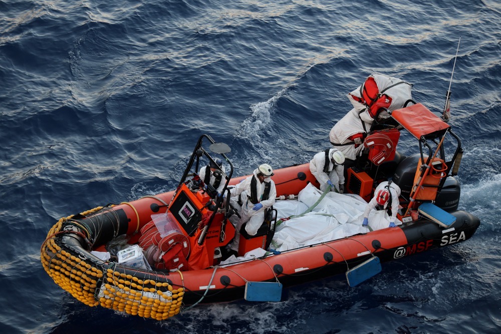 Handout image shows Medecins Sans Frontieres (MSF) teams sailing on the boat with dead bodies of migrants in body bags retrived from the Mediterranean sea June 7, 2024. (MSF via Reuters)