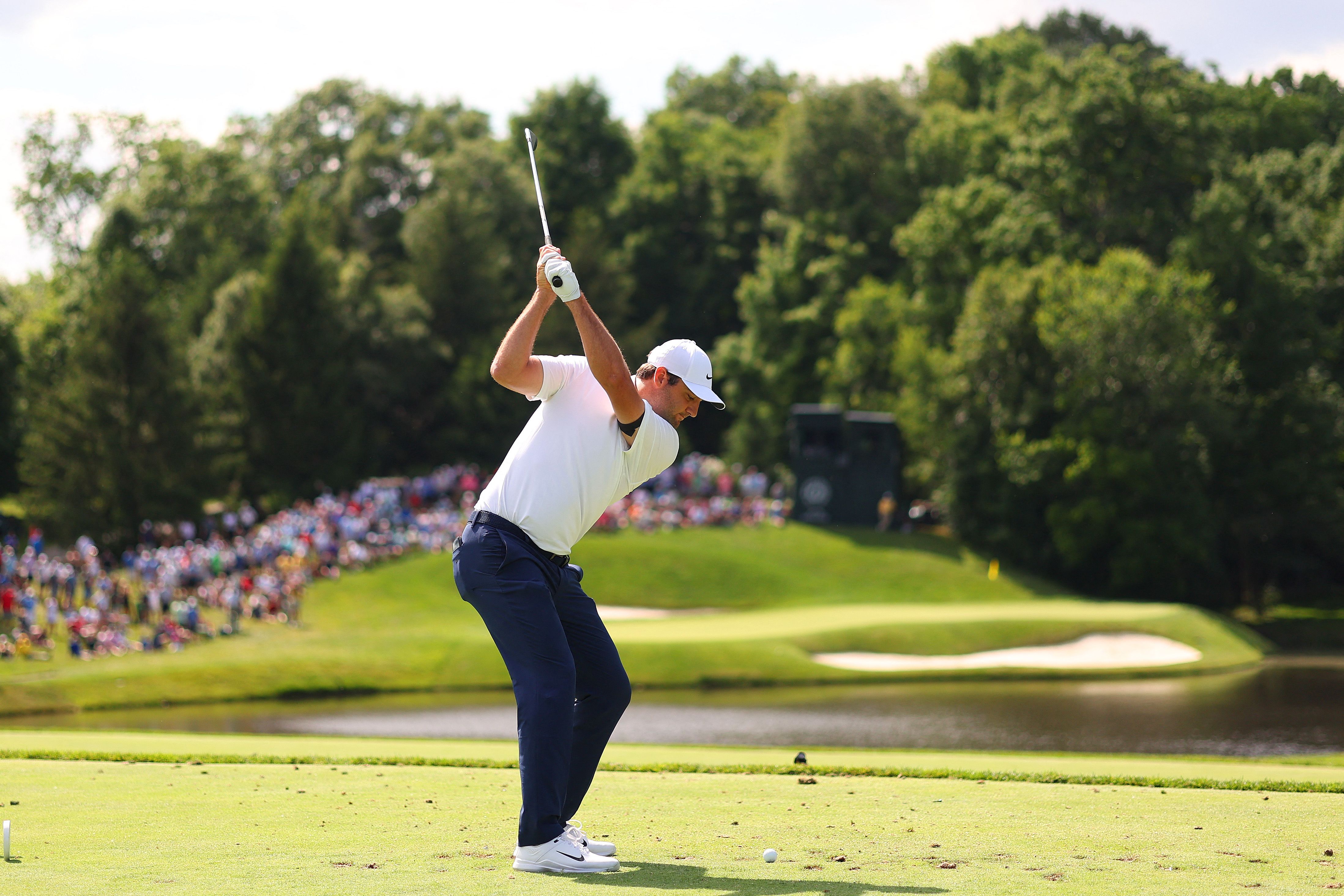 Scottie Scheffler of the US plays his shot from the 12th tee during the second round of the Memorial Tournament presented by Workday at Muirfield Village Golf Club in Dublin, Ohio. (File/AFP)