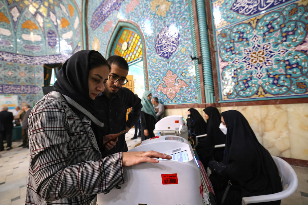 About 80 hopefuls have submitted their candidacy for the early presidential election on June 28, but must wait to see whether they are approved by the Guardian Council. Above, Iranians vote at a polling station in Tehran during the parliamentary runoff elections on May 10, 2024. (AFP)