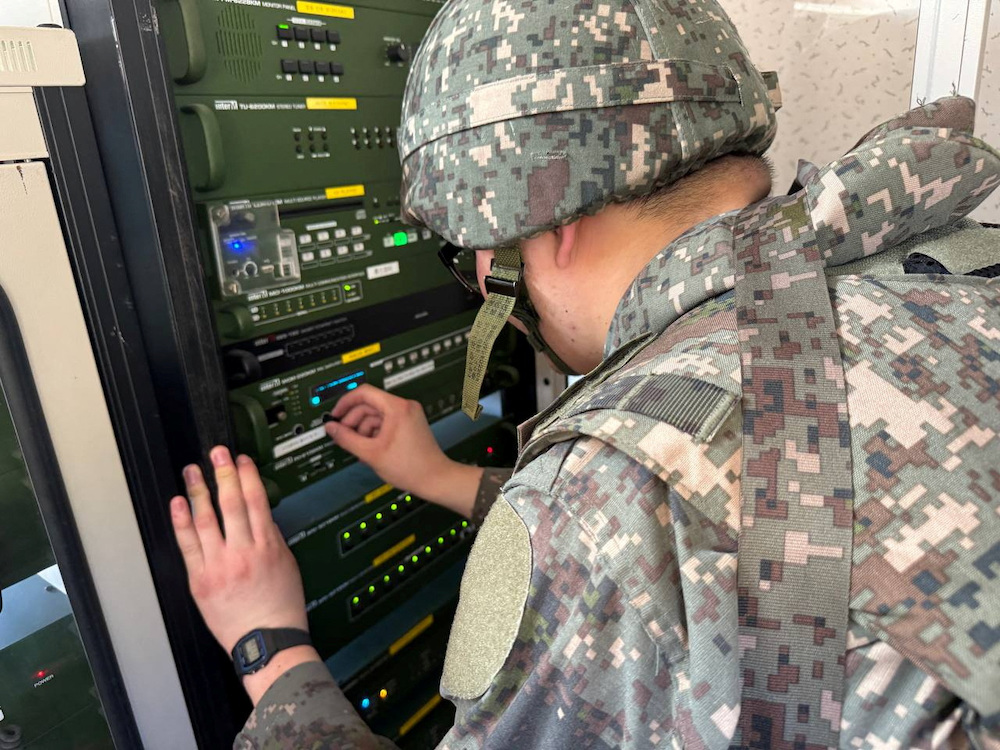 A South Korean soldier works on a loudspeaker that is set up for propaganda broadcasts near the demilitarized zone separating the two Koreas in Paju, South Korea on June 9, 2024. (The Defense Ministry via Reuters)