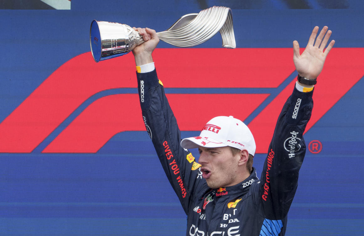 Red Bull Racing driver Max Verstappen, of the Netherlands, celebrates after his victory at the Formula 1 Canadian Grand Prix auto race in Montreal, Sunday, June 9, 2024. (The Canadian Press via AP)