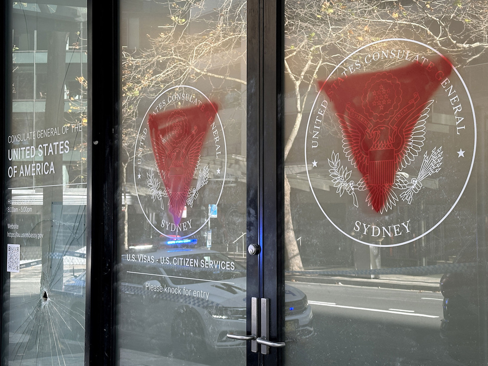 Pro-Palestinian symbols are spray-painted on the US consulate in Sydney, Australia on June 10, 2024. (AAP via Reuters)